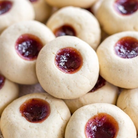 Super soft and delicious vanilla thumbprint cookies filled with jam.