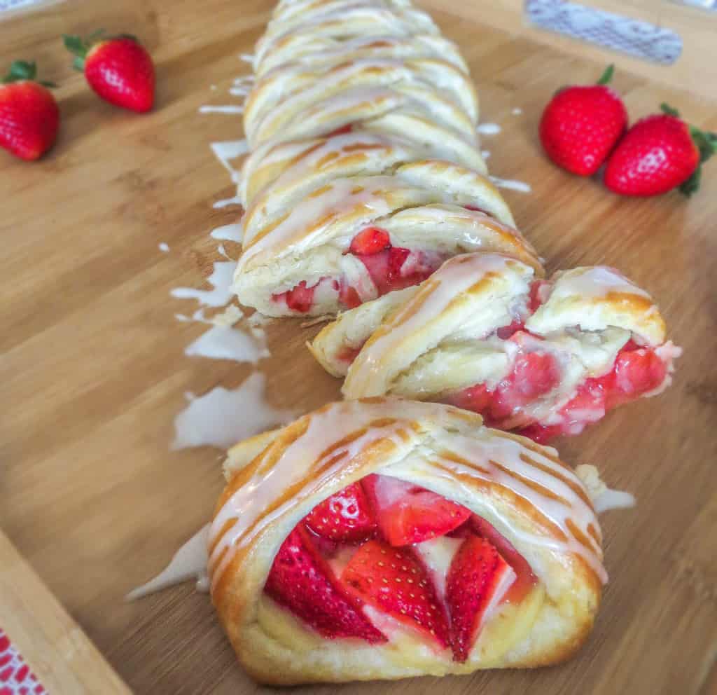 Strawberry Danish Braid. One of my favorite breakfasts! A delicious, sweet filling of strawberries and pastry cream. The dough is so simple to make and takes no time at all!