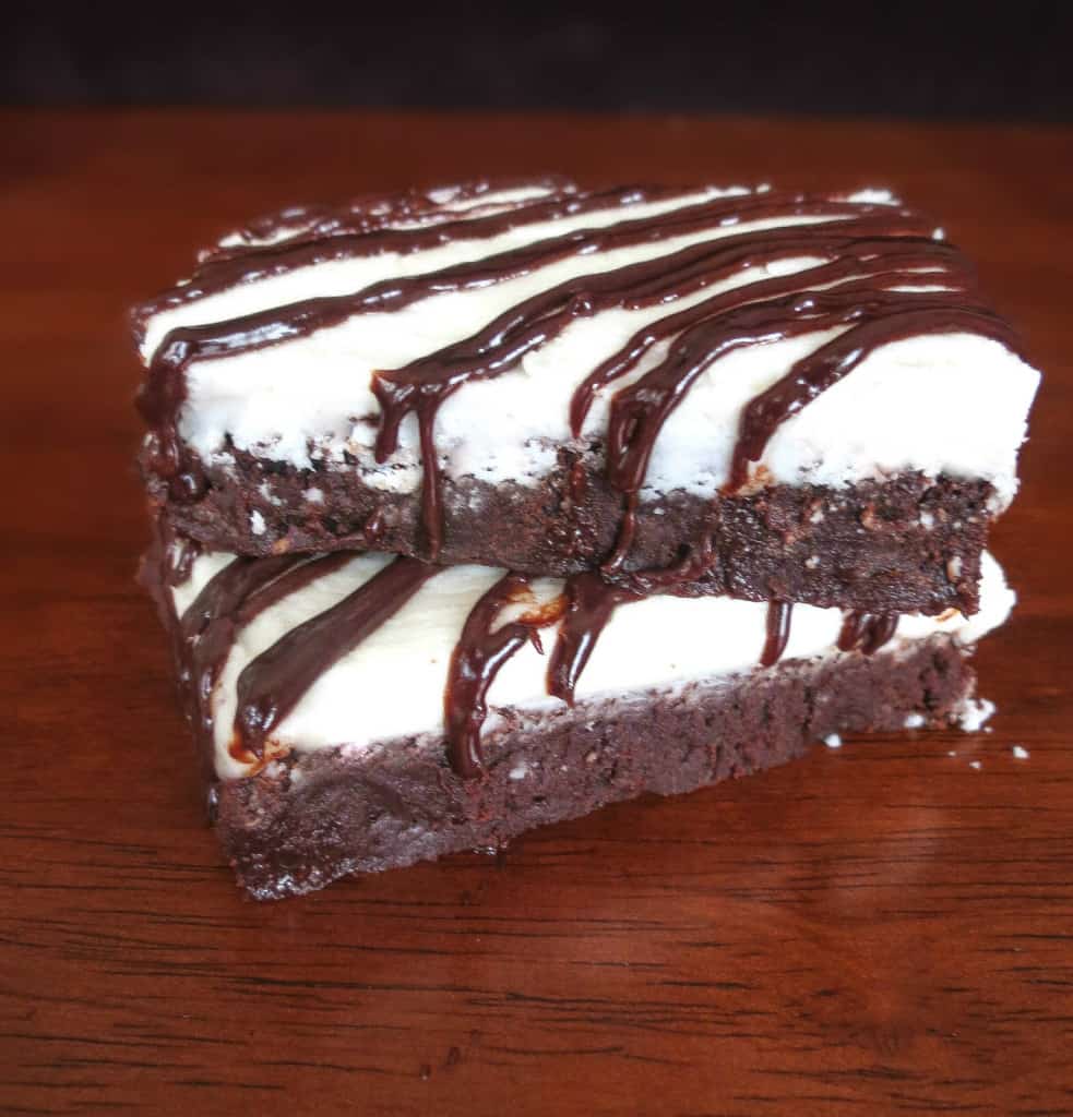 Peppermint Pattie Brownies. A thick, creamy peppermint layer on top of a super fudgy brownie. Tastes just like a peppermint pattie in brownie form! So good.
