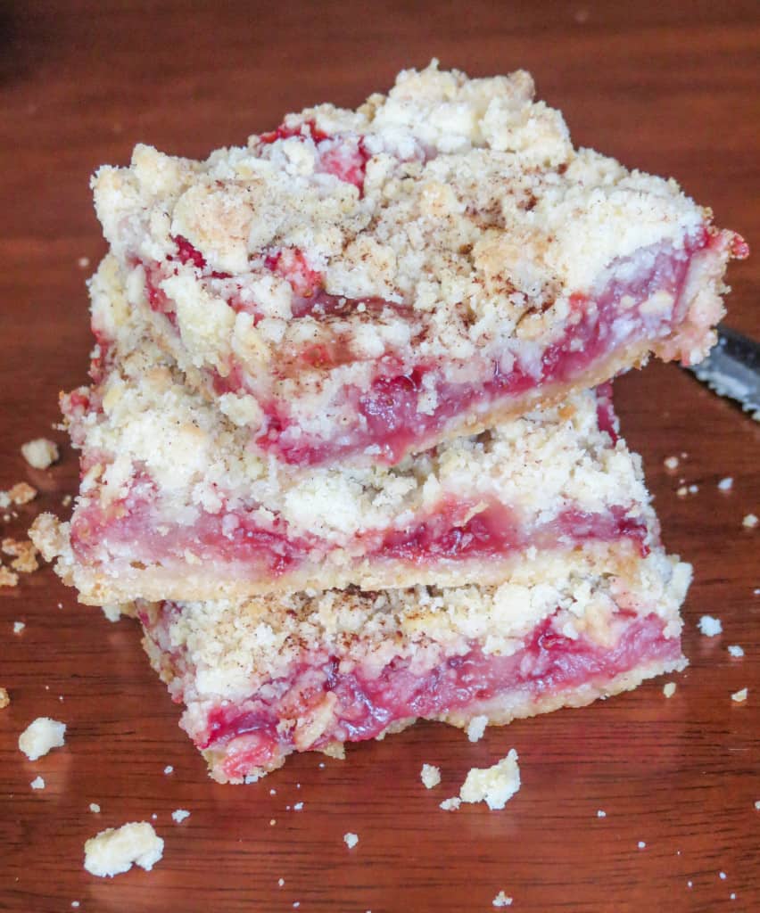 Strawberry Crumble Bars. The quickest, easiest most delicious breakfast treat! A buttery crust covered with a nice thick layer of juicy, gooey strawberries, sprinkled with some more buttery deliciousness on top!