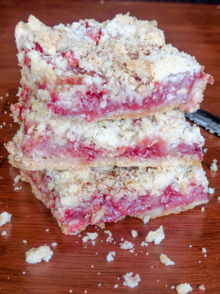 Strawberry Crumble Bars. The quickest, easiest most delicious breakfast treat! A buttery crust covered with a nice thick layer of juicy, gooey strawberries, sprinkled with some more buttery deliciousness on top!
