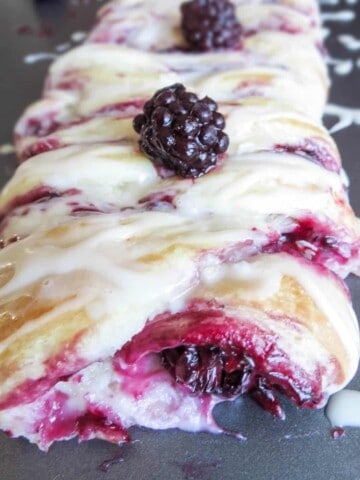 Blackberry danish braid on a baking sheet.