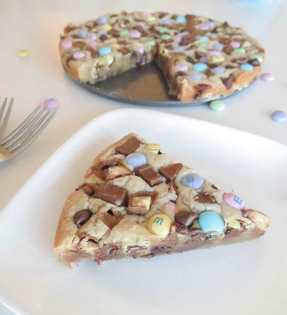 Loaded Soft and Chewy Twix M&M Cookie Cake