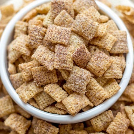 Crunchy rice chex cereal is coated in cinnamon sugar for the easiest and most addicting snack ever created. - Cinnamon Sugar Chex Mix