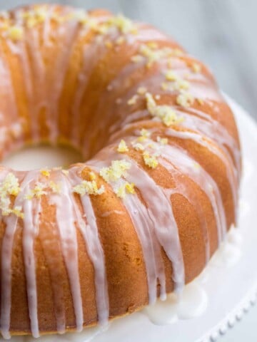 Super Lemon Bundt Cake - The softest, lemon-packed cake on the face of the earth. If you are a lemon lover, this will be your new favorite!