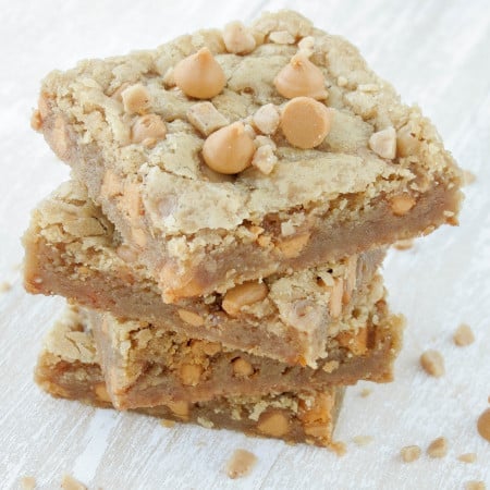 Butterscotch blondies stacked on top of each other.