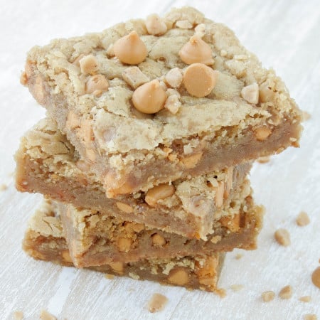 Butterscotch blondies stacked on top of each other.