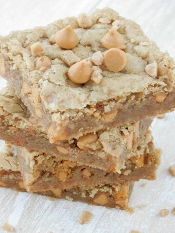 Butterscotch blondies stacked on top of each other.