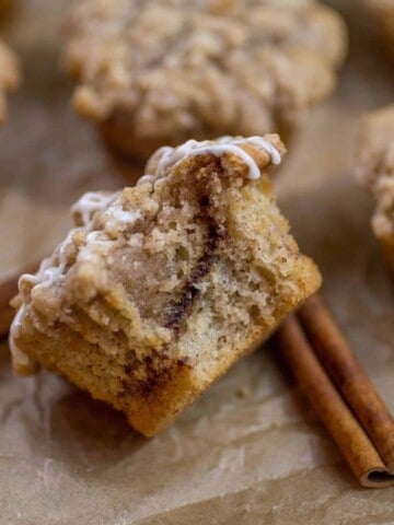 Cinnamon Swirl Coffee Cake Muffin on its side revealing the center.