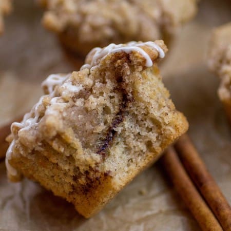Cinnamon Swirl Coffee Cake Muffin on its side revealing the center.