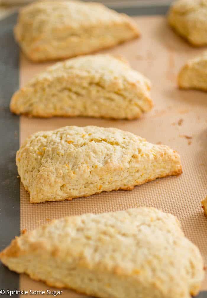 Fresh Orange Scones - These perfectly tender scones have such a bright citrus flavor and are topped off with a sweet + tangy orange glaze.