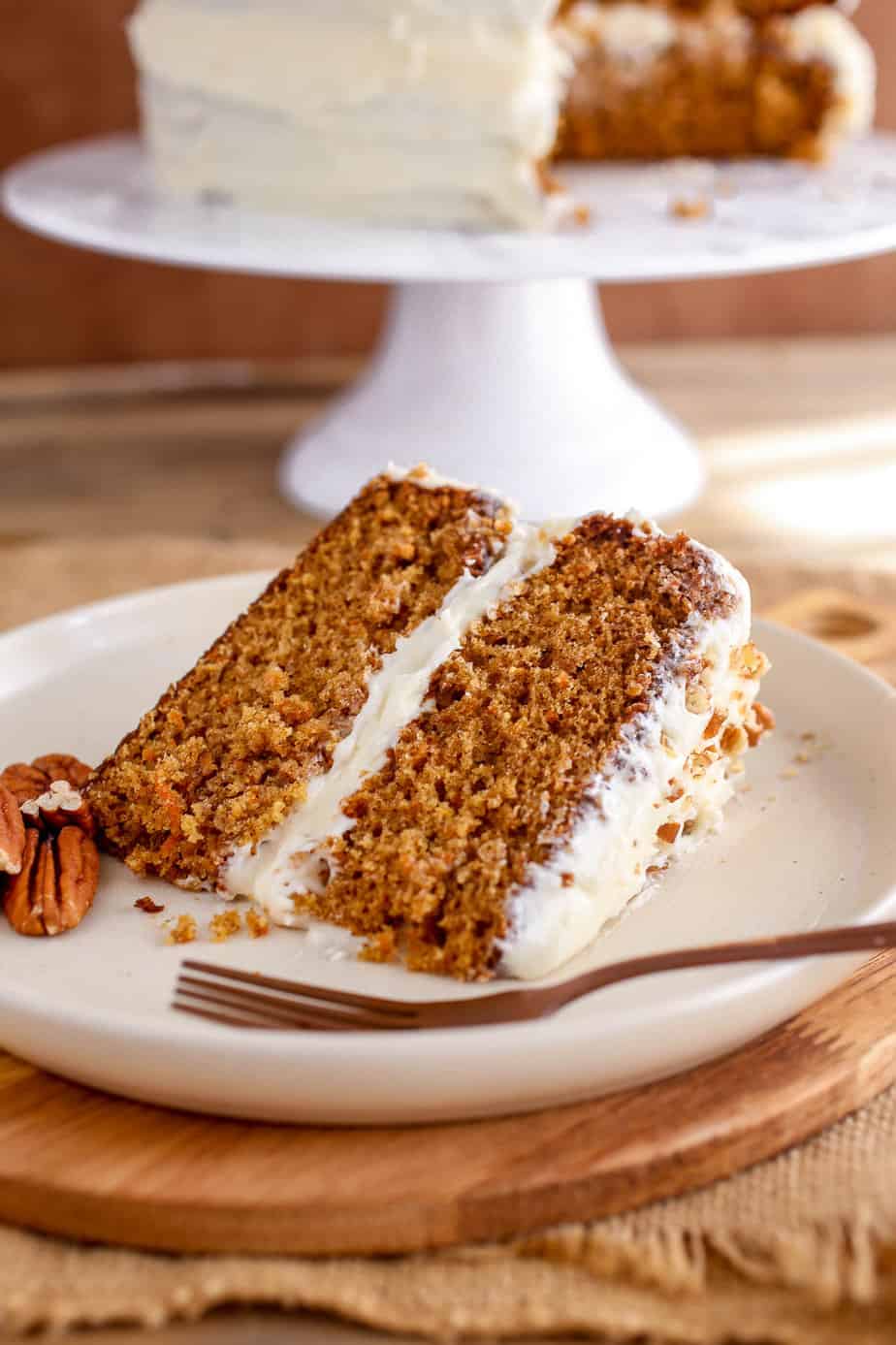 Slice of carrot cake on a plate.