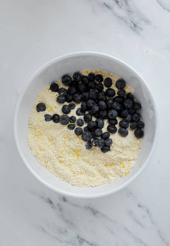 Lemon blueberry scones ingredients in a bowl.