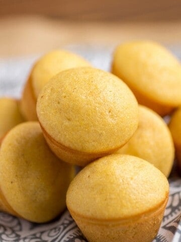 Stack of honey corn muffins.