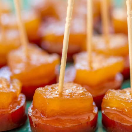 Glazed hawaiian kielbasa on a skewer appetizer.