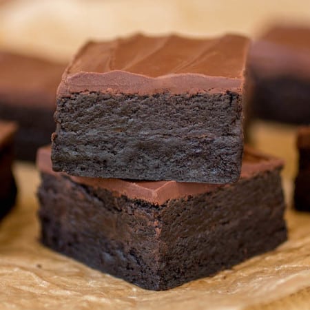 Triple Dark Chocolate Truffle Brownies stacked.