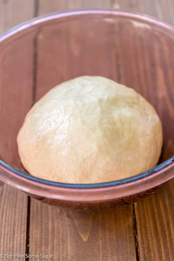 Pizza dough in greased bowl before rising.