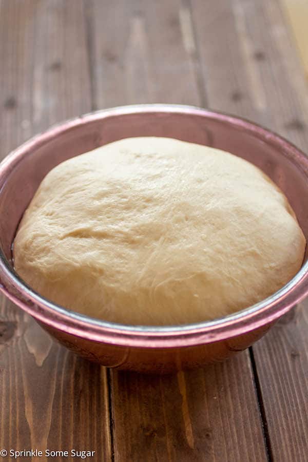 Pizza dough in greased bowl before rising.