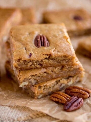 pecan blondies in a stack of three.