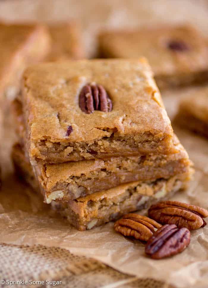 Browned butter pecan blondies stacked.