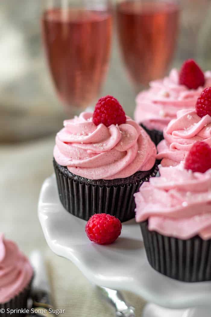 Dark Chocolate Cupcakes with Raspberry Champagne Frosting - Sprinkle Some Sugar