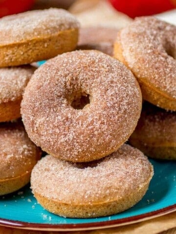 Plate full of apple cider donuts.