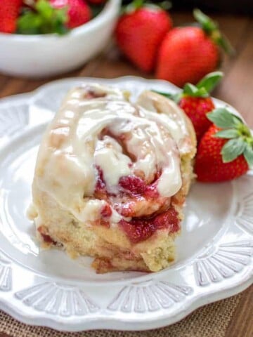 Strawberry Cinnamon roll on a plate.