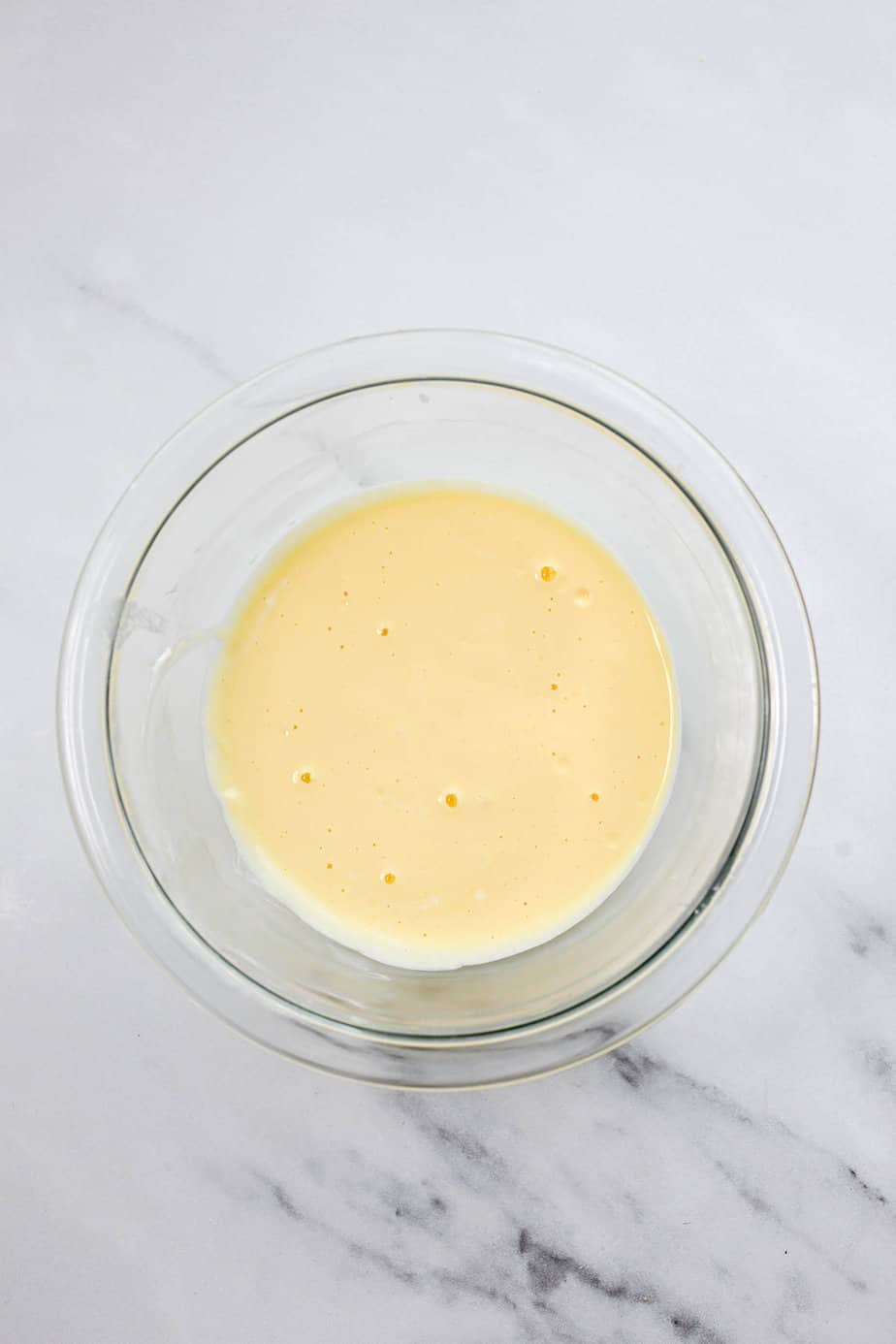 Sour cream and egg whisked together.