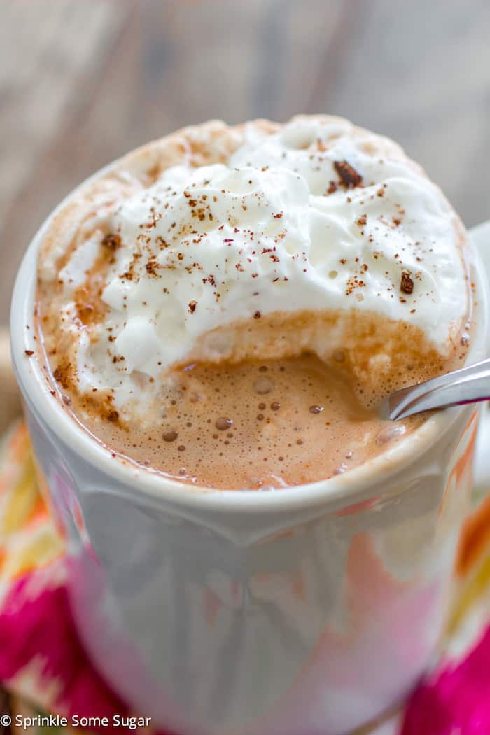 Slow Cooker Mexican Hot Chocolate - Hot Chocolate infused with cinnamon, nutmeg and chili powder to give it a depth of flavor you wouldn't believe until you tried it!