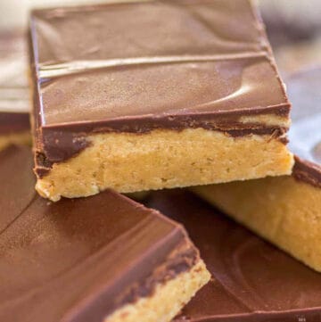 Close-up shot of no-bake peanut butter cup bars on a plate.