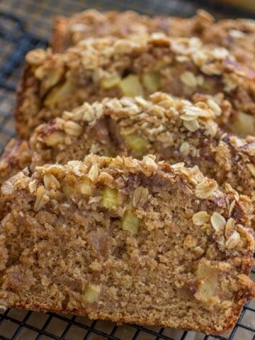 Apple Cinnamon Streusel Bread slices leaning on each other.