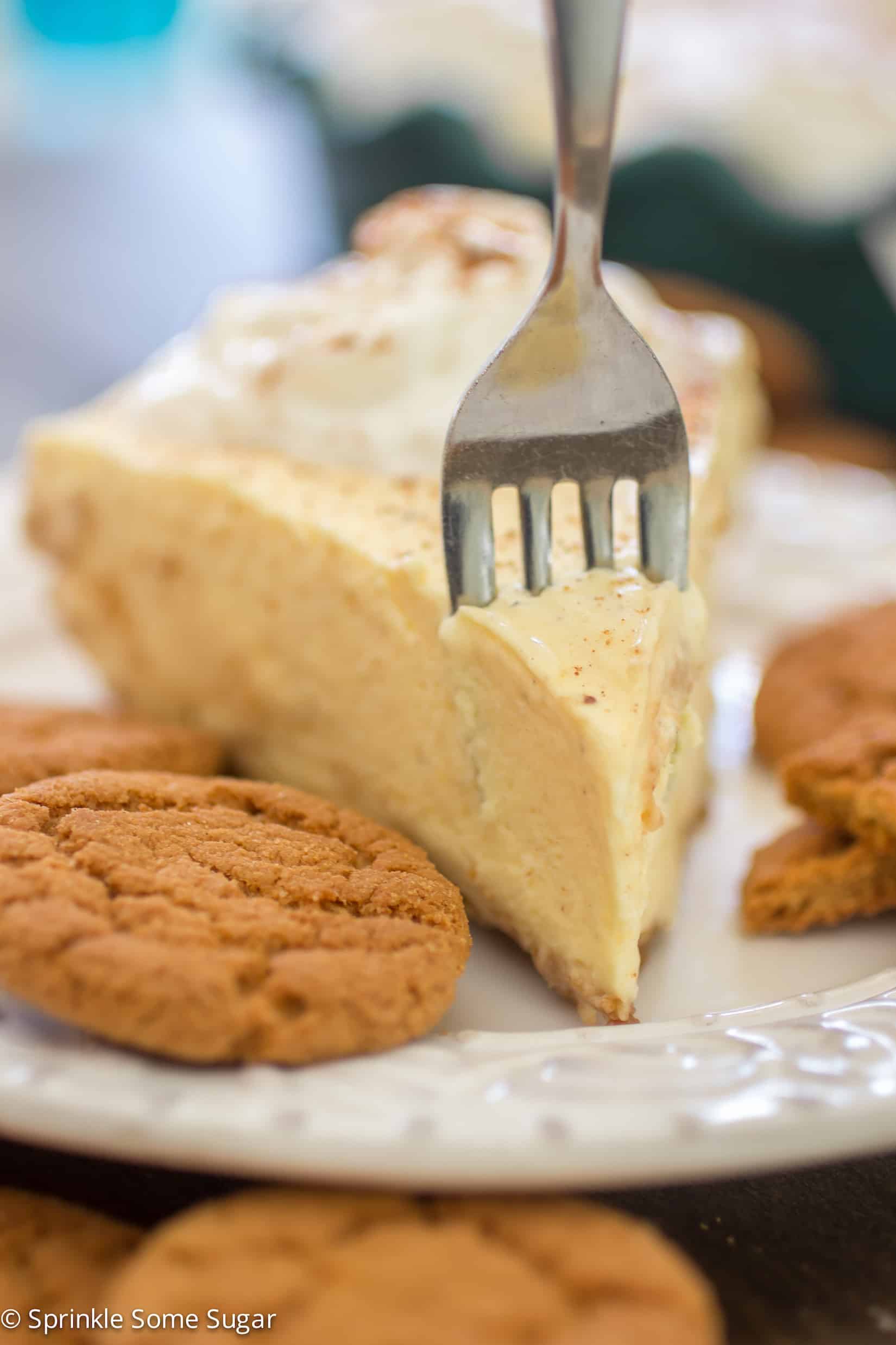 A spicy gingersnap crust is filled with a super creamy, flavorful eggnog filling and topped with Reddi-wip®. - Sprinkle Some Sugar