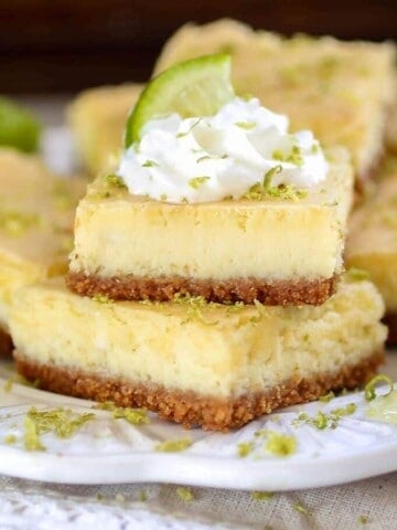 Key Lime Cheesecake Bars - Tart, tangy and sweet, these creamy Key Lime Cheesecake bars are sure to be a crowd pleaser!﻿