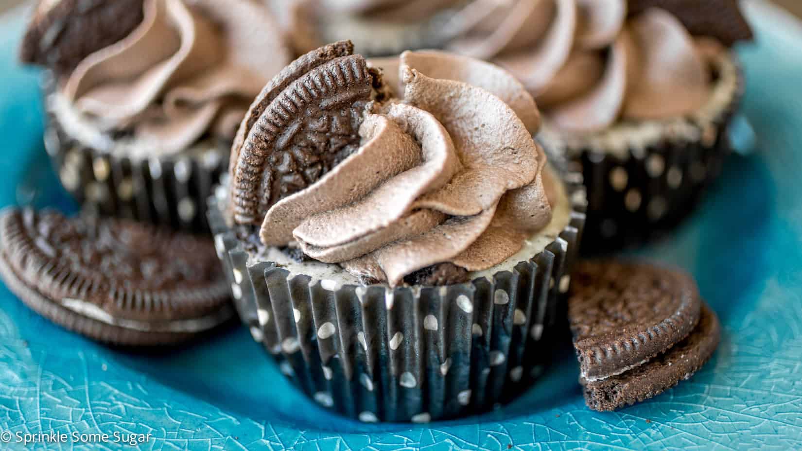 Mini Oreo Cheesecakes with Dark Chocolate Whipped Cream - These creamy mini Oreo cheesecakes with dark chocolate whipped cream are chock full of Oreos with an Oreo crust and topped with homemade whipped cream!