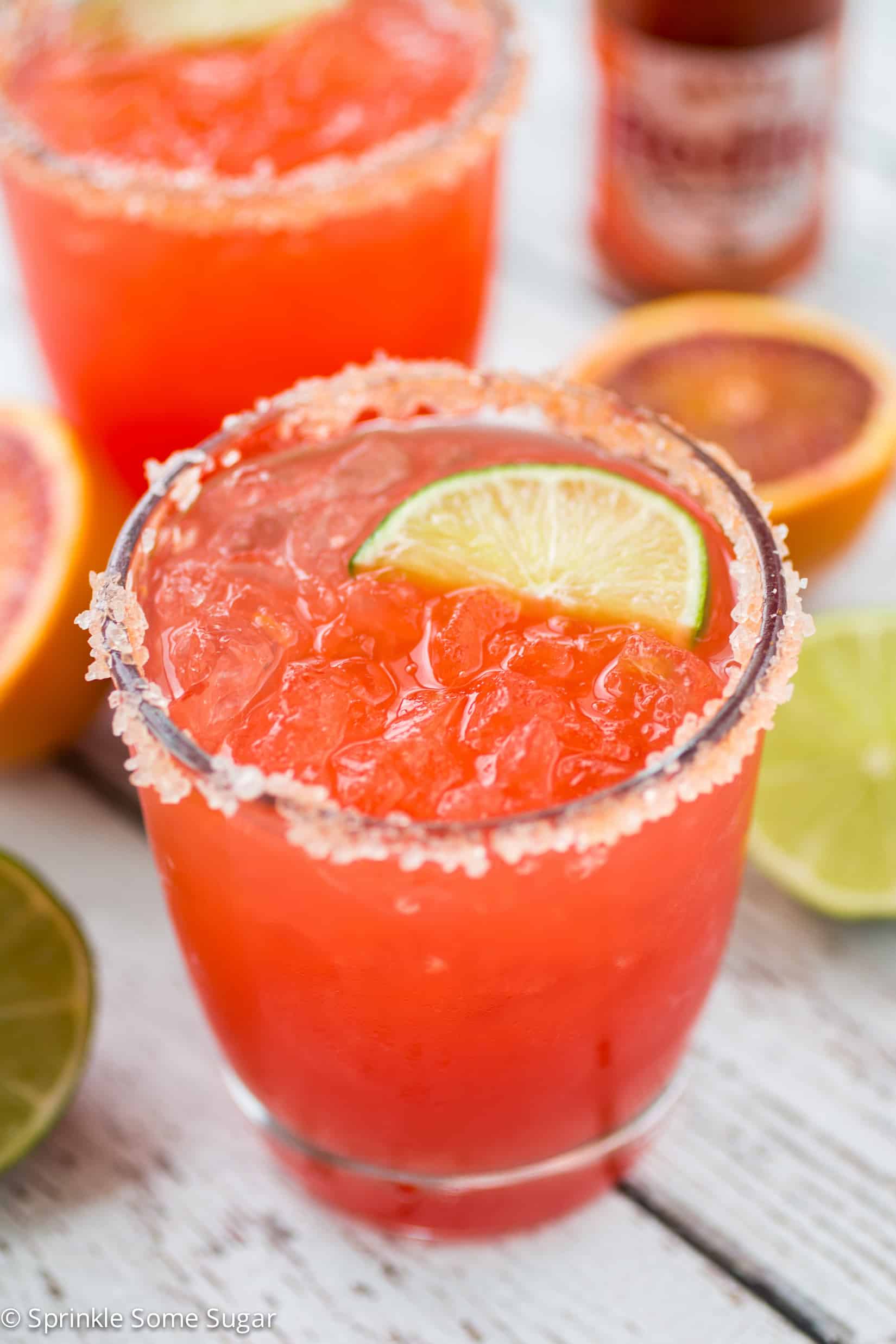 Spicy Blood Orange Margaritas - Margaritas made with freshly squeezed blood orange juice and a few dashes of hot sauce for a sweet and spicy kick!