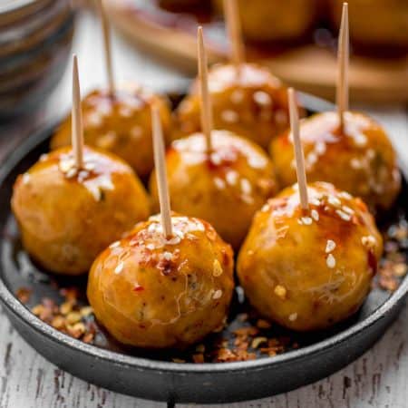 Kung Pao Chicken Meatballs - Extremely flavorful asian chicken meatballs are covered in a spicy kung pao sauce!