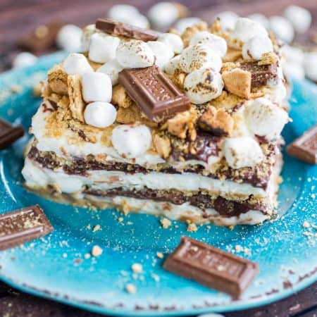 S'mores Icebox Cake - An over-the-top s'mores icebox cake complete with marshmallow whipped cream, soft chocolate ganache, graham crackers and toasted marshmallows!
