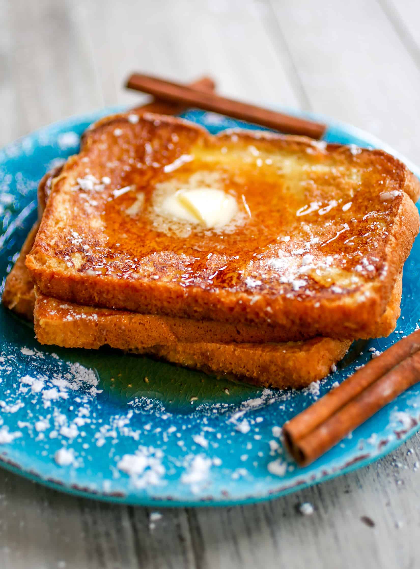 Eggnog French Toast - Sweet, lightly spiced breakfast perfection is what I like to call this eggnog french toast! The perfect holiday season breakfast!