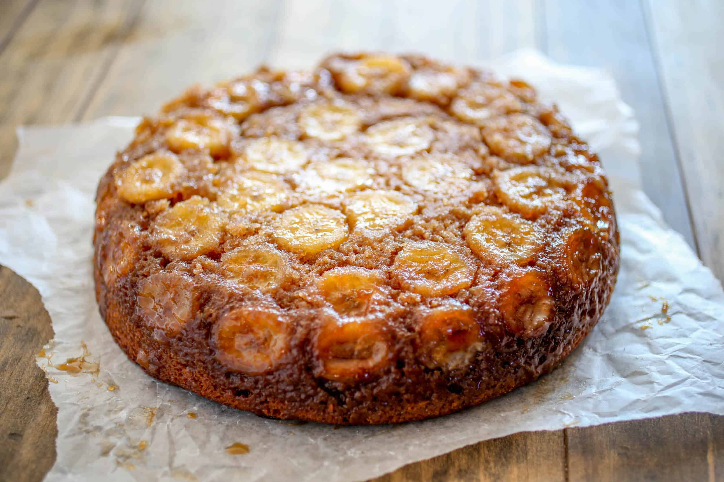 Spiced Upside Down Banana Cake - Lightly spiced and topped with fresh bananas and caramelized brown sugar, this Banana Upside Down Cake is sure to be a winner.