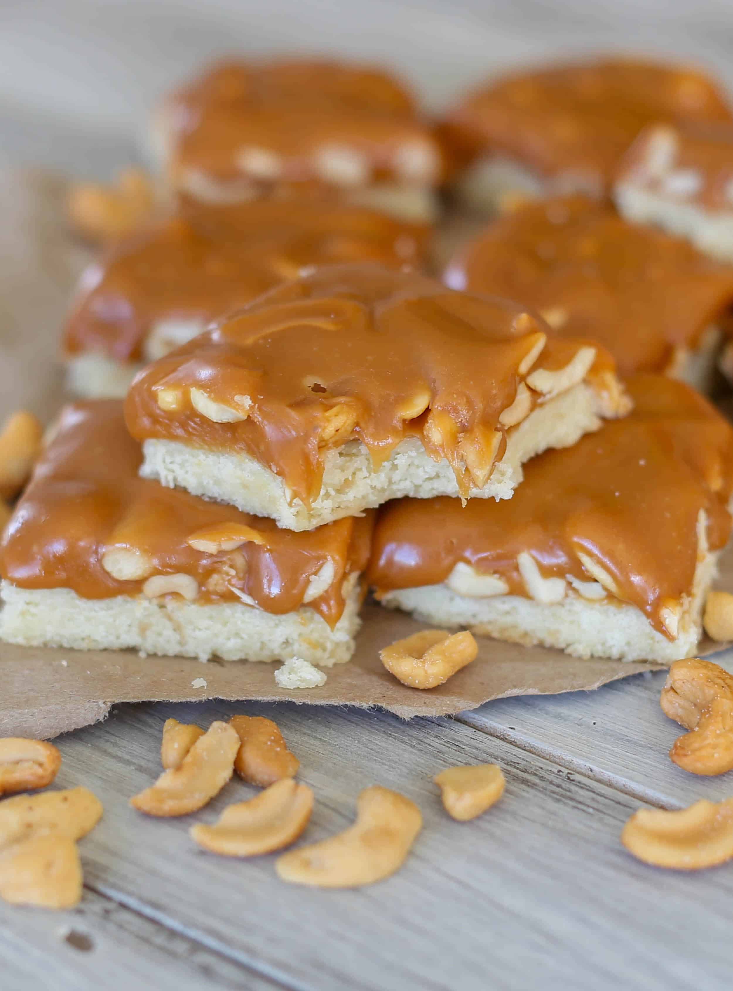 A buttery shortbread crust is topped with creamy caramel and crunchy cashews! Such a delicious combination. - Sprinkle Some Sugar