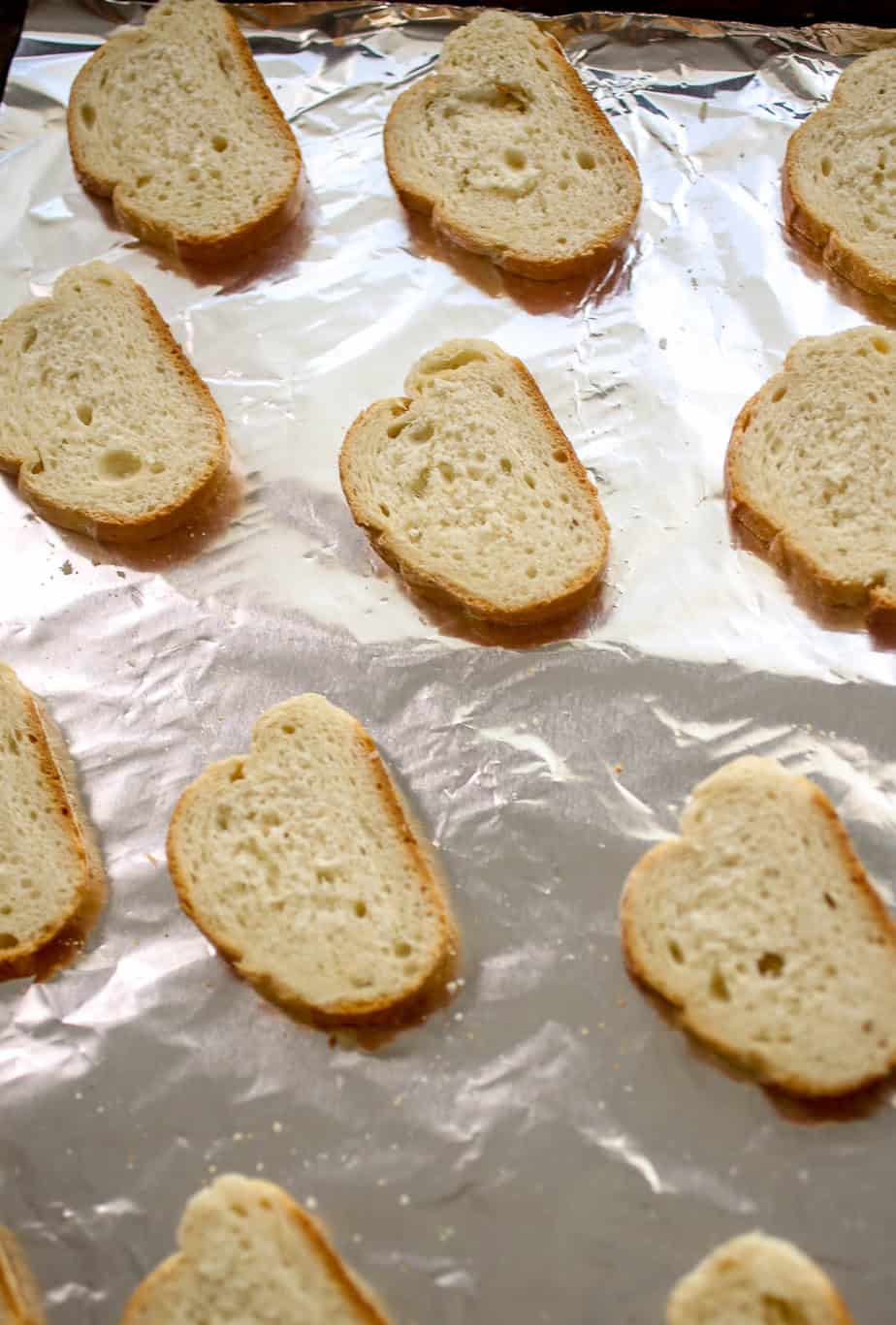 Italian bread slices before toasting.