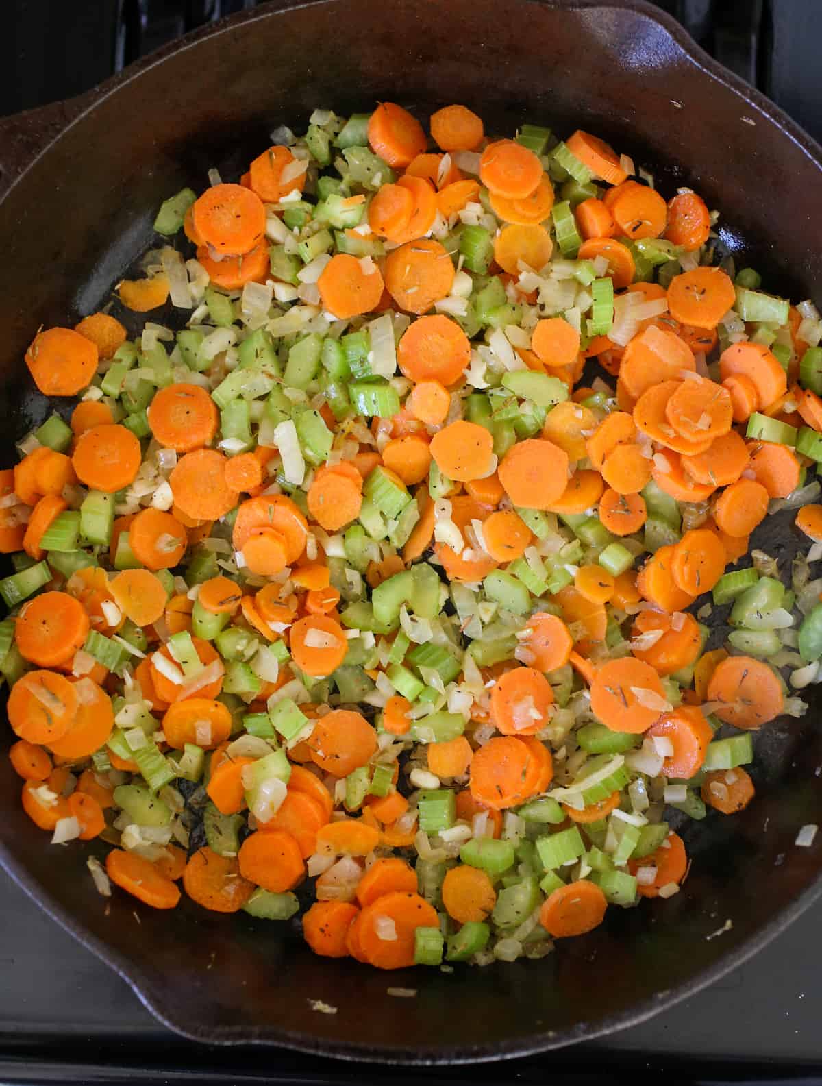 Sautéing carrots, celery and onion.
