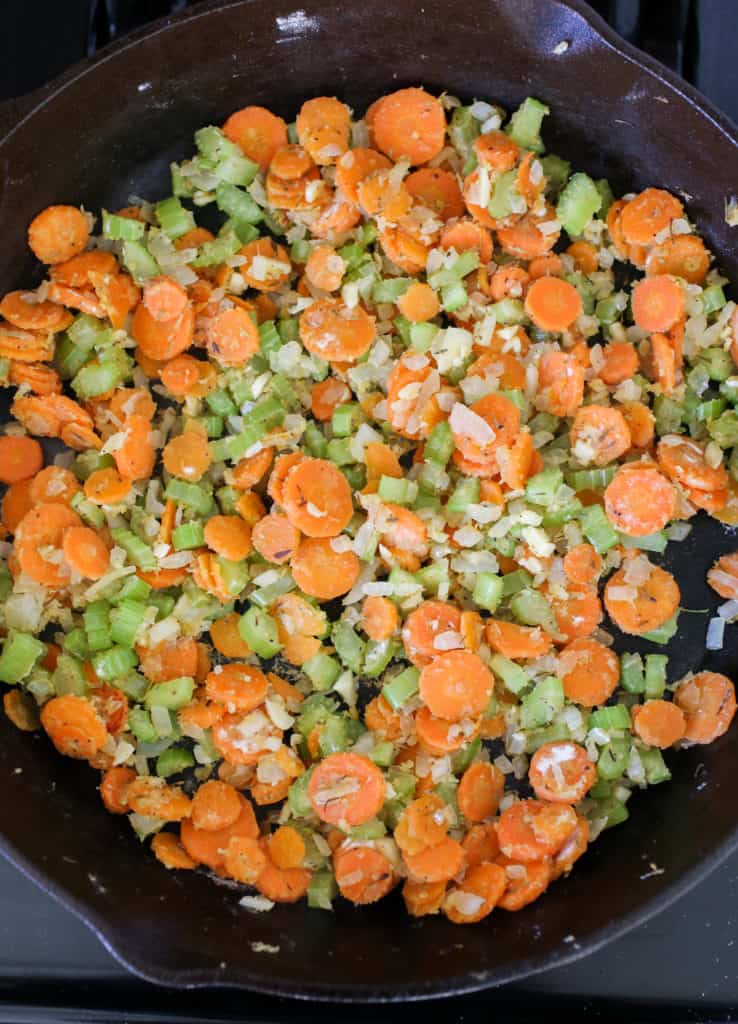 Flour mixed into sautéed carrots, celery and onion.