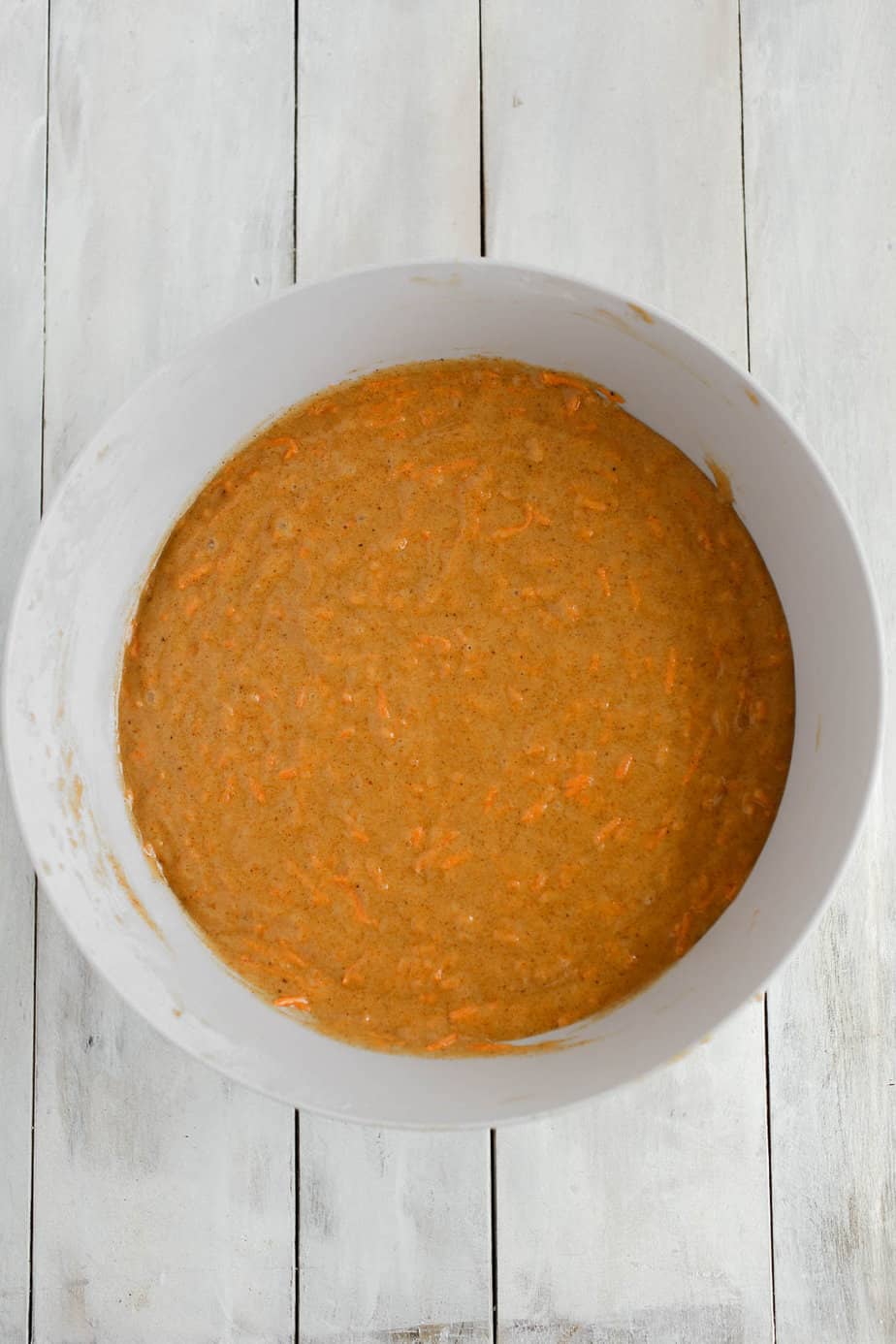 Carrot cake batter in a bowl.