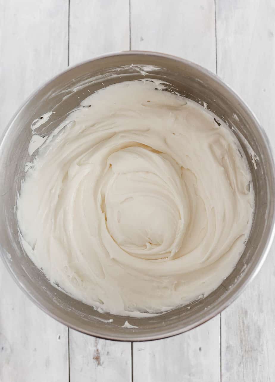 Cream cheese frosting in a bowl.