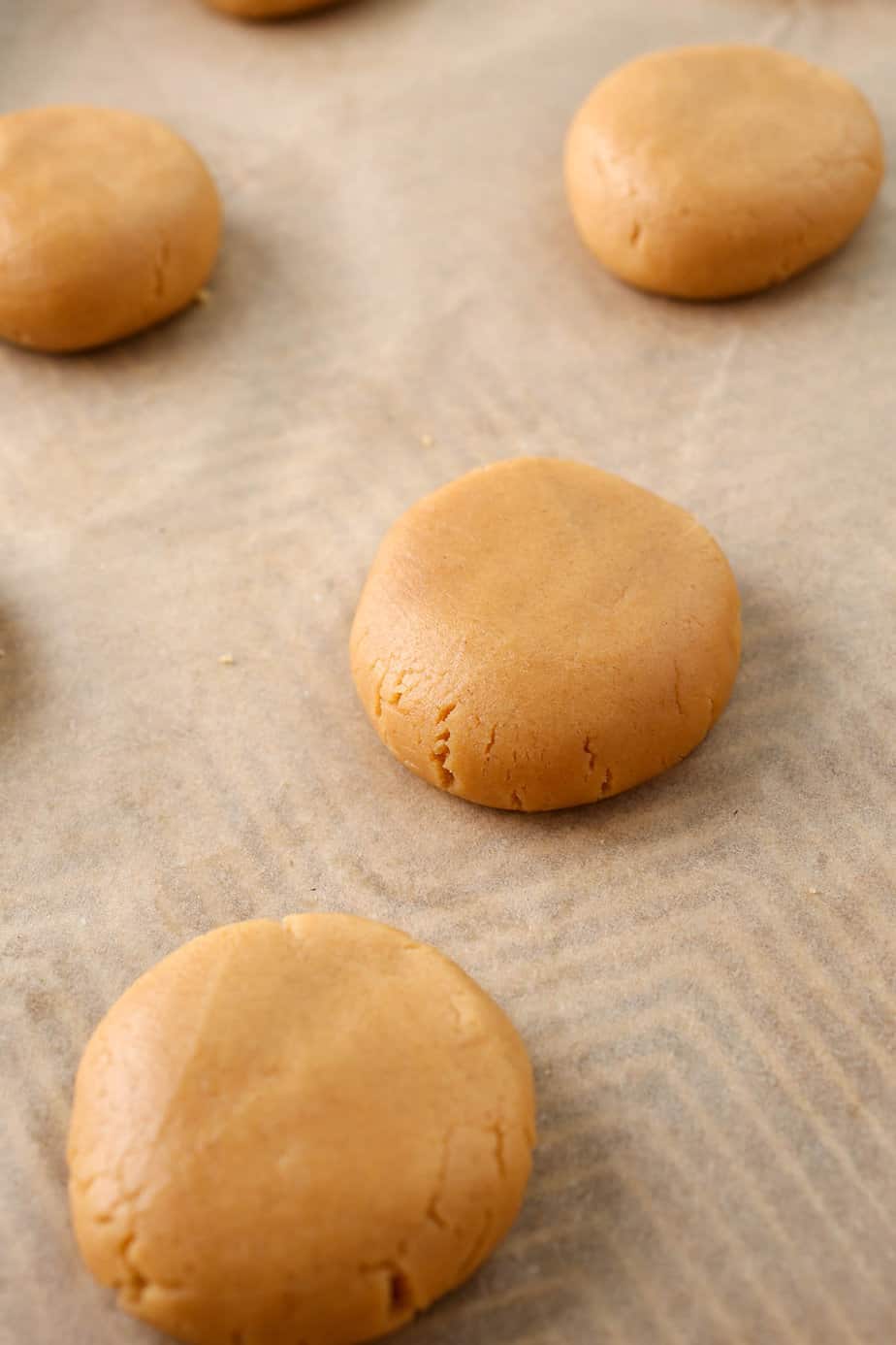 Peanut butter cookie dough balls ready to bake.